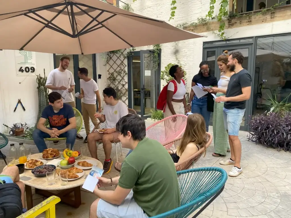 How does coworking boost productivity compared to working from home?